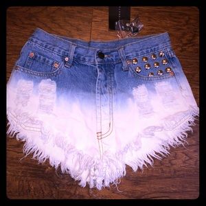 Distressed ombré denim shorts
